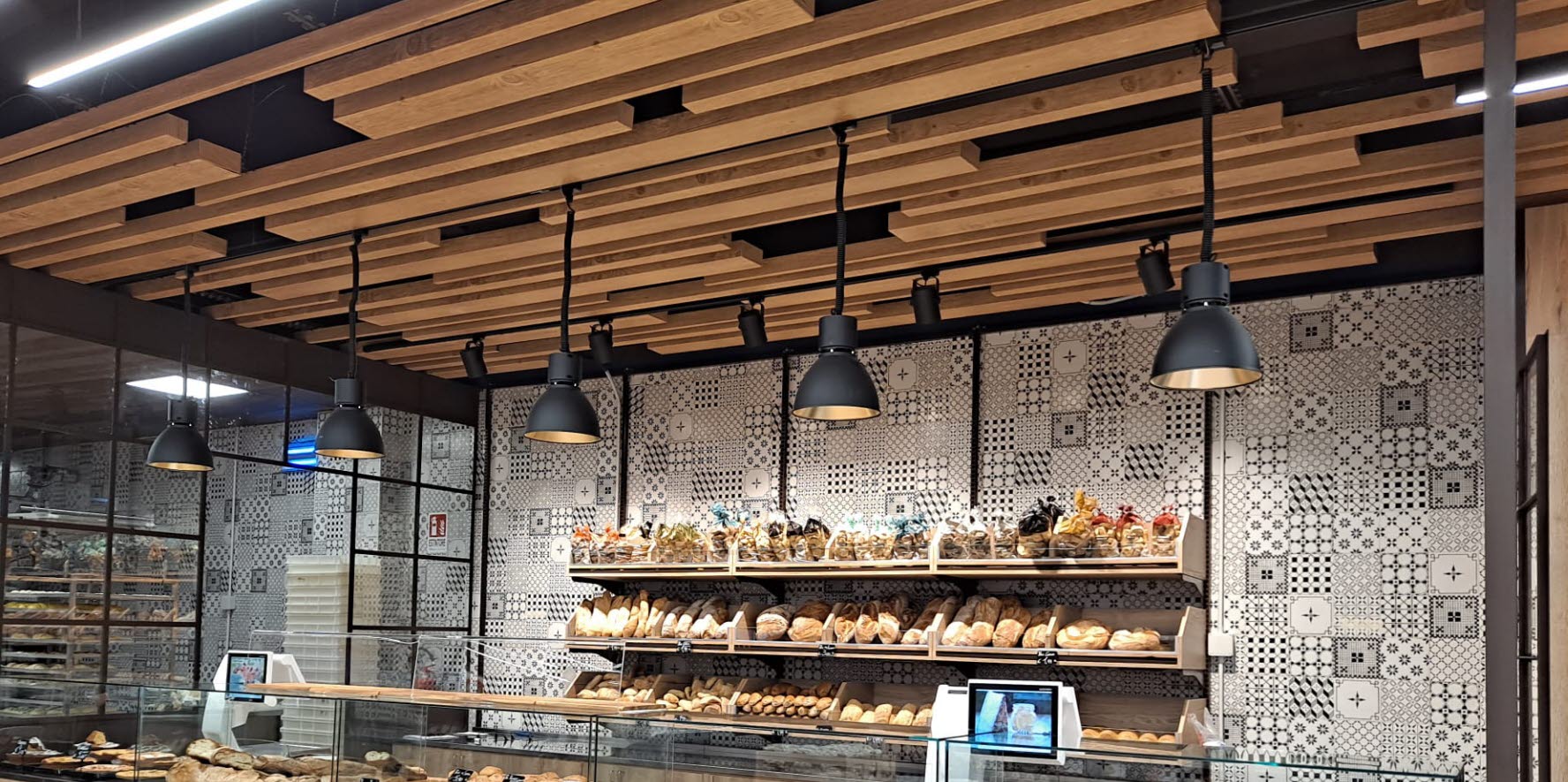 Designing interior fixtures and lighting for Retail stores_ Custom Made High-grade Bread Retailing Shop Fittings Display Fixtures Bakery Stores_Decorative pendant light in the ceiling.